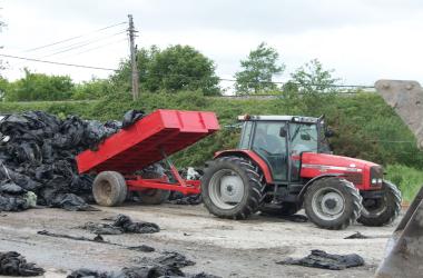 Photo of tractor unloading rubbish